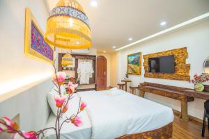 Mimosa Homestay Hanoi電視和／或娛樂中心