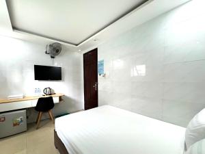 TV a/nebo společenská místnost v ubytování Thanh Hiền HB Hotel