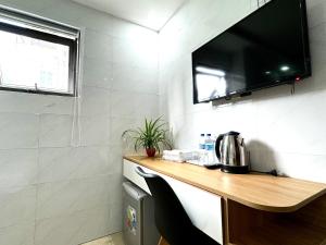 Kuchyň nebo kuchyňský kout v ubytování Thanh Hiền HB Hotel