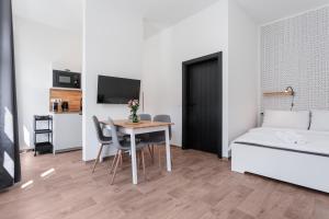 Postel nebo postele na pokoji v ubytování Apartmány Stříbrná Liška