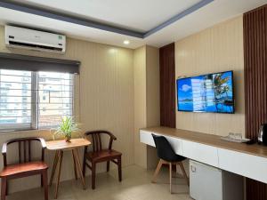 TV a/nebo společenská místnost v ubytování Thanh Hiền HB Hotel