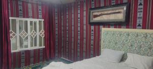 Ένα ή περισσότερα κρεβάτια σε δωμάτιο στο Country House Bidiya +2 φωτογραφίες