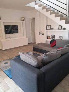 Χώρος καθιστικού στο Belle villa à 600 m de l'océan +17 φωτογραφίες