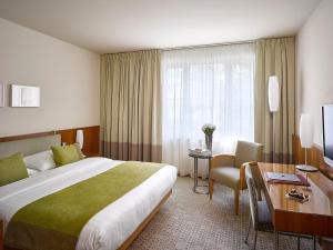Postel nebo postele na pokoji v ubytování K+K Hotel Central + 37 fotografií