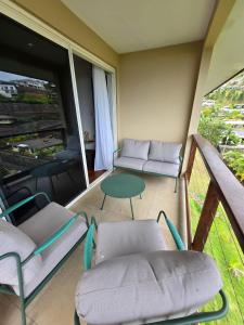 Posezení v ubytování TITOU LODGE - Hauteurs de Miri
