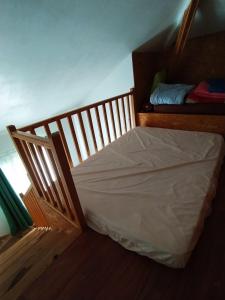 เตียงในห้องที่ Ti'Commerson