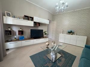 A television and/or entertainment centre at Prima Perla