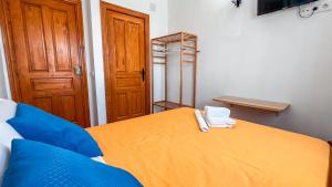 Postel nebo postele na pokoji v ubytování La Tortuga Lodging Rooms