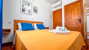 Postel nebo postele na pokoji v ubytování La Tortuga Lodging Rooms