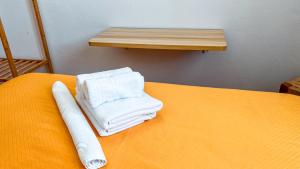Postel nebo postele na pokoji v ubytování La Tortuga Lodging Rooms