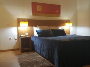 Cama ou camas em um quarto em Hotel Jose Alberto
