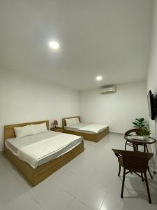 Postel nebo postele na pokoji v ubytování Maria Hotel