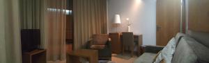 Uma área de estar em Hotel Jose Alberto