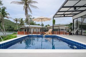 Πισίνα στο ή κοντά στο Zen Beach Lake Villa 1