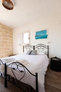 Postel nebo postele na pokoji v ubytování Trappito Stracca Agriturismo