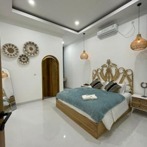 Кровать или кровати в номере Unit Gypsea Villa Deba Sugihmukti +4 фотографии