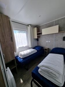Postel nebo postele na pokoji v ubytování Chalet ZilverZand Renesse