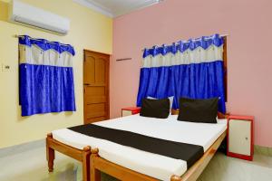 Postel nebo postele na pokoji v ubytování Super Hotel O A.R. Lodge