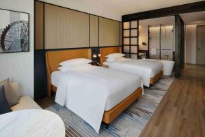 Postel nebo postele na pokoji v ubytování Sheraton Lanzhou Anning