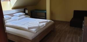 Posteľ alebo postele v izbe v ubytovaní Szabó Lux Apartman
