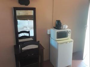 Η κουζίνα ή μικρή κουζίνα στο The Baobab Inn
