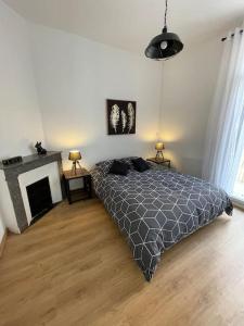 Ένα ή περισσότερα κρεβάτια σε δωμάτιο στο Bel appartement - Béziers - 4 pers - Balcon - Centre - IUT