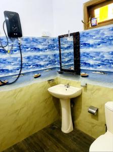 TV a/nebo společenská místnost v ubytování Sadew Home Stay