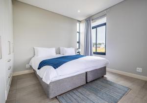 Postel nebo postele na pokoji v ubytování Hotel Olivewood