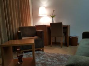 Uma área de estar em Hotel Jose Alberto