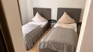 Posteľ alebo postele v izbe v ubytovaní Lou Garden Suite