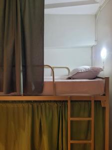 Letto o letti in una camera di Friends Hostel