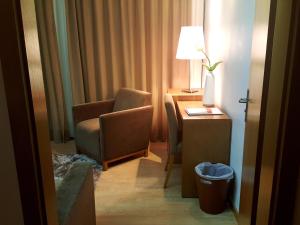 Uma área de estar em Hotel Jose Alberto