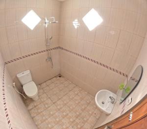 Koupelna v ubytování Griya Nakula Homestay Jogja + 17 fotografií