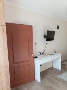 Μια τηλεόραση ή/και κέντρο ψυχαγωγίας στο Apartman Petrovic