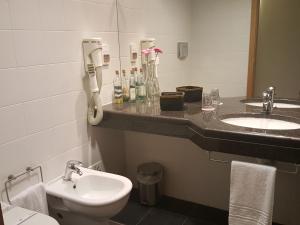 Um banheiro em Hotel Jose Alberto