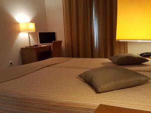 Cama ou camas em um quarto em Hotel Jose Alberto