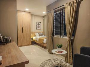 Postel nebo postele na pokoji v ubytování Olive Hotel Millers Road by Embassy Group