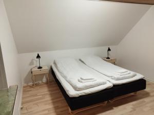 Postel nebo postele na pokoji v ubytování Fjeldgaard - Aarup