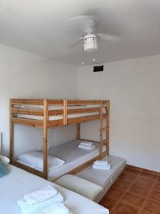 Posteľ alebo postele v izbe v ubytovaní Precioso apartamento con piscina y garage