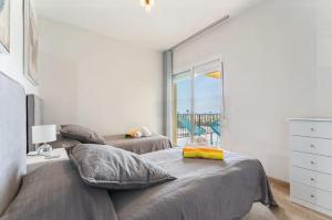 Posteľ alebo postele v izbe v ubytovaní Villa Vista Verde -Sea views -3 Bedrooms -Heated Pool + 37 fotografií