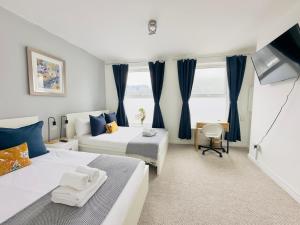 Postel nebo postele na pokoji v ubytování Shoreditch Rooms