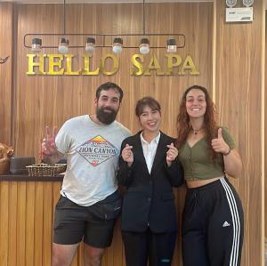 a man and two women giving the thumbs up at HeLLo Sapa Hotel in Sapa