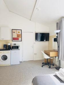 Kuchyň nebo kuchyňský kout v ubytování Shoreditch Rooms
