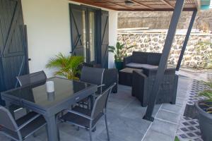 Posezení v ubytování Ka Hema - Maison entière avec Jacuzzi et vue sur mer