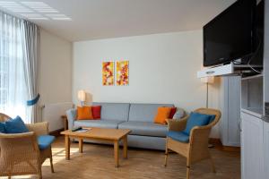 TV a/nebo společenská místnost v ubytování Hapimag Resort Dünenblick