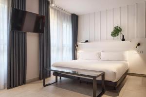 Ramirez Flats Valencia客房内的一张或多张床位