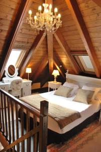 Postel nebo postele na pokoji v ubytování Hotel Selba d'Ansils