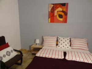 Posteľ alebo postele v izbe v ubytovaní Apartamenty Polna