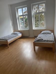 Postel nebo postele na pokoji v ubytování ES-Unterkunft Dinslaken