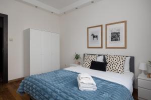 Posteľ alebo postele v izbe v ubytovaní Royal Wilanów 2-bedroom Apartment
